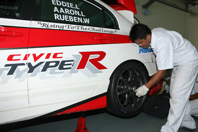 Tireman checking the wheel nut torque