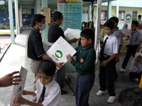 Lucky students receiving their goody bags after the talk.