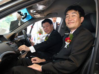 Mr Atsushi Fujimoto and Yang Berhormat Dato' Nga Kor Ming in the Honda Accord.